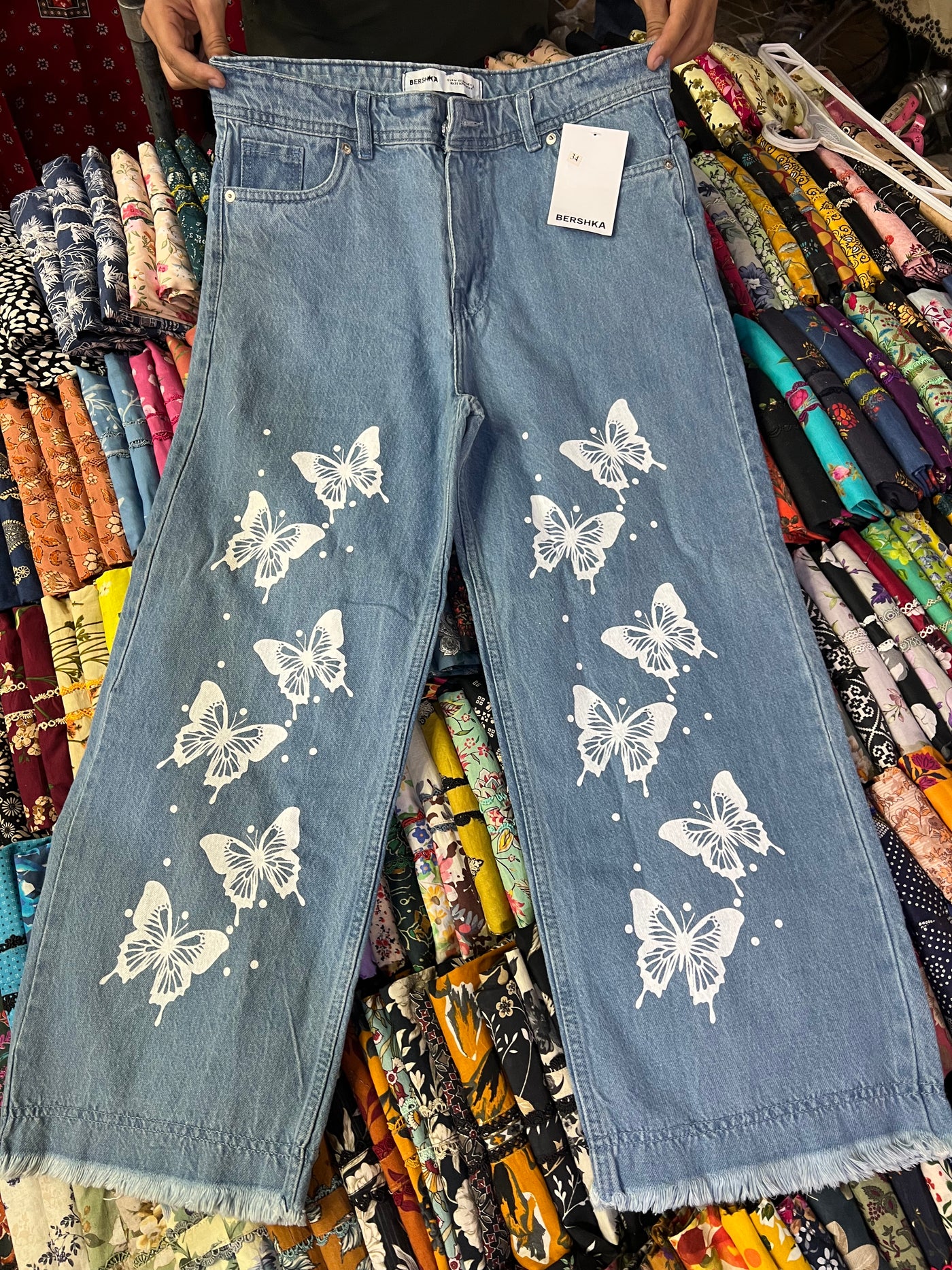 Butterfly Print Wide - Leg Jeans